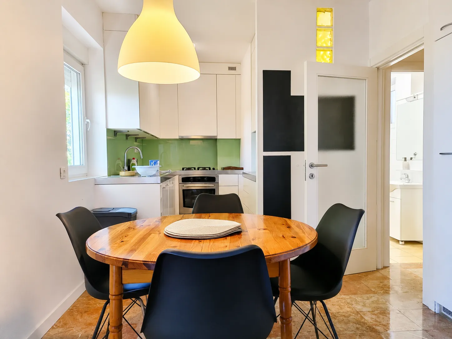 Kitchen with a round dining table